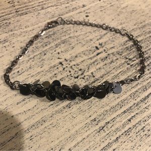 Vintage black bracelet with tiny black discs.